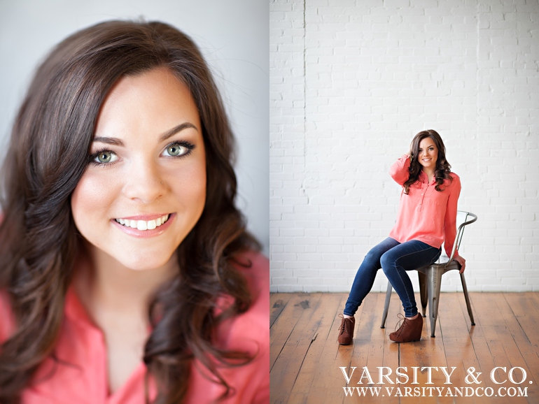 girl against a brick wall senior picture