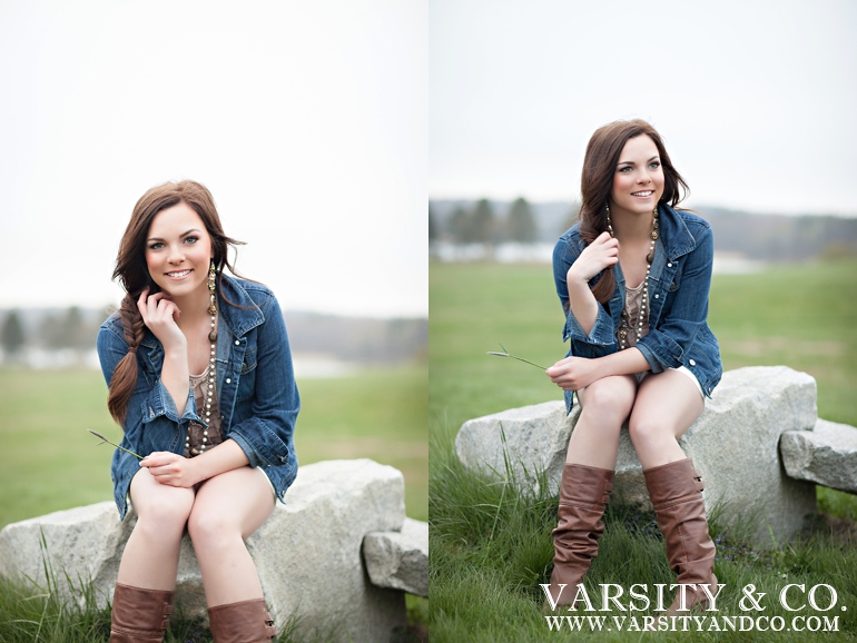 girl sitting on a rock senior picture