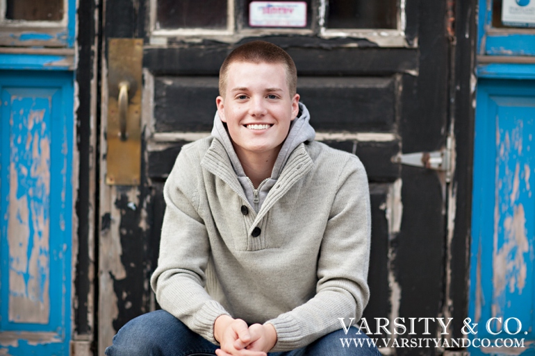 guy against a building senior picture