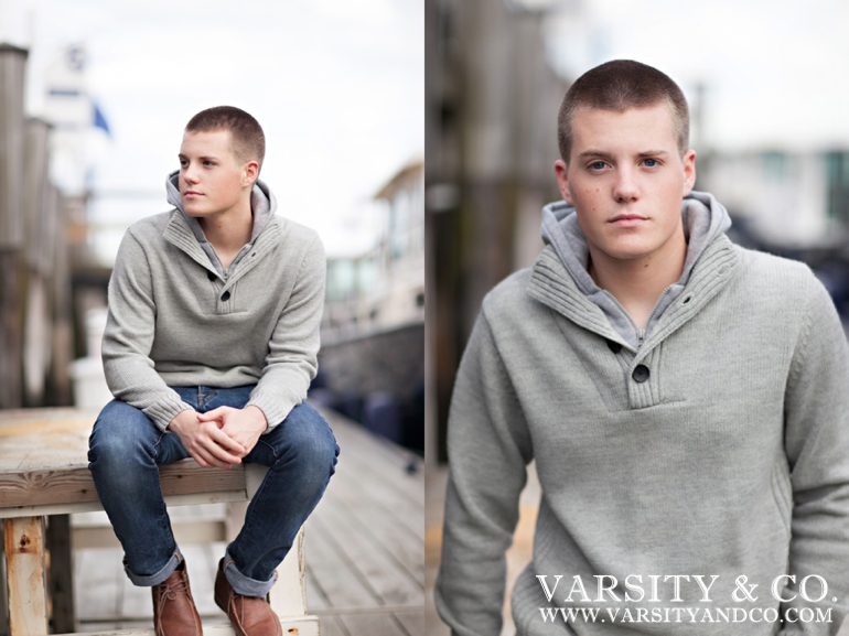 guy sitting on the dock in maine senior picture