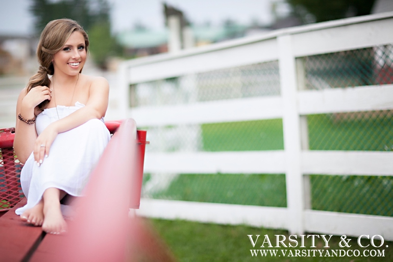 girl in a wagon senior picture