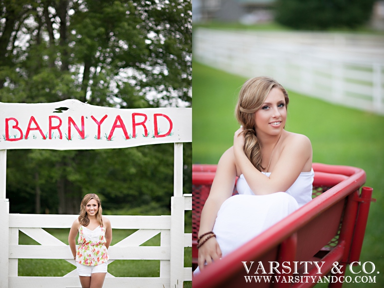 girl standing in front of a white fence senior picture