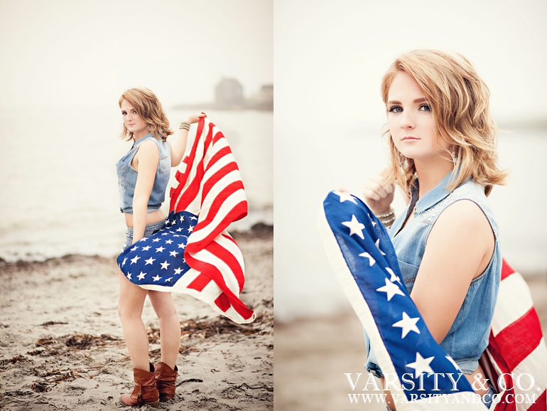girl holding and american flag on the beach senior picture