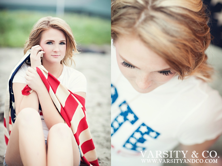 girl wrapped in the american flag on the beach senior picture