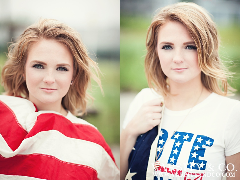 girl wrapped in american flag senior picture